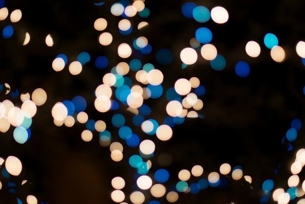 Blurred Christmas lights glowing in the dark